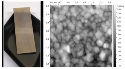 Left: a sample of a silver nanostructured film, deposited by the electroless technique on a glass plate with dimensions 2.5 × 7.5 cm. Right: a zoom in on the silver nanostructured electroless film at 1.5 µm × 1.5 µm by atomic force microscopy. Credit: Dominique Vouagner Image of the SERS substrate